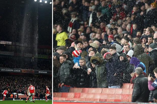 酋长球场屋顶漏水，因为阿森纳球迷被迫离开座位以避免被倾盆大雨浸透