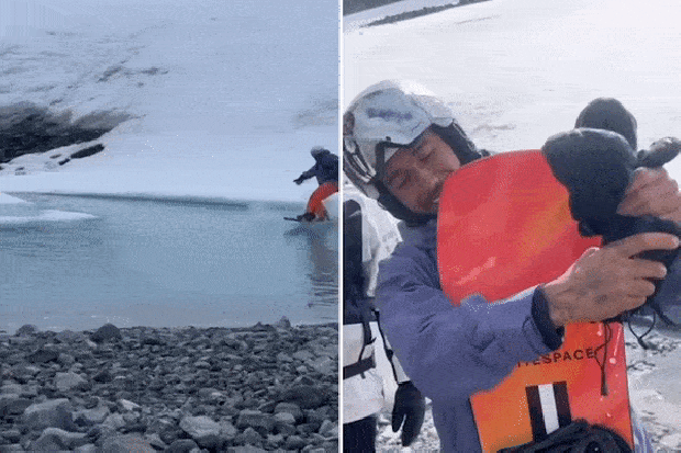 观看“传奇”刘易斯·汉密尔顿在滑雪板进入冰冷的南极海水时全身湿透……然后爬上山再试一次