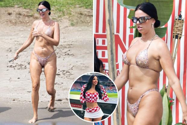 世界杯“最炙手可热的球迷”伊万娜·诺尔 (Ivana Knoll) 在马贝拉度假时穿着几乎没有的比基尼沐浴阳光